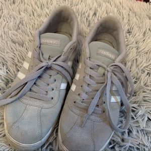 Grey Adidas athletic shoe